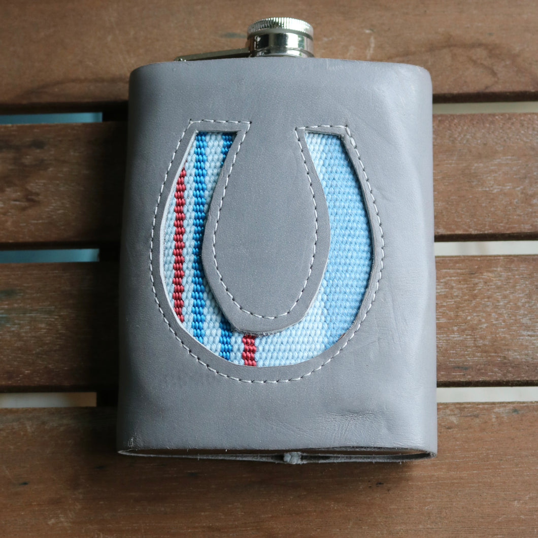 Vintage hose and leather wrapped flask